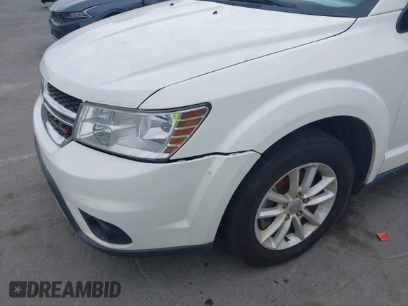 2017 Dodge Journey SXT with VIN 3C4PDCBG4HT572573, listed as a IAAI auction lot 42036006 with 209,854 mi miles and . Bid and sale history available at DreamBid. Image 18.
