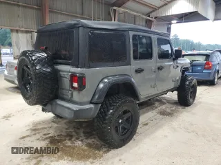 2018 Jeep Wrangler Unlimited Sport S с VIN 1C4HJXDNXJW225524, выставлен на аукционе Copart как лот 59790115 с пробегом 141 537 миль миль и Списание • Salvage title. История ставок и продаж доступна на DreamBid. Изображение 3.