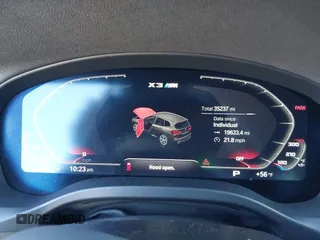 2021 BMW X3 M z VIN 5YMTS0C06M9F45134, wystawiony jako IAAI lot #41867376 z przebiegiem 35 237 mil mil oraz . Historia ofert i sprzedaży dostępna na DreamBid. Obrazek 7.