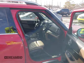 2019 MINI Countryman Cooper S with VIN WMZYT5C57K3E69637, listed as a IAAI auction lot 41379982 with 100,891 mi miles. Bid and sale history available at carsss.com. Image 5.