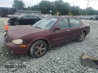 2001 Nissan Maxima SE with VIN JN1CA31A91T112723, listed as a Copart auction lot 58784315 with 243,060 mi miles and Salvage title. Bid and sale history available at DreamBid. Image 1.