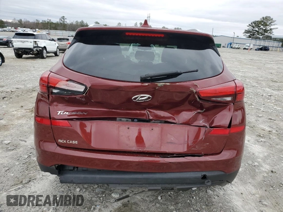 2019 Hyundai Tucson Sport with VIN KM8J33AL0KU875219, listed as a Copart auction lot 86816254 with 82,829 mi miles and Salvage Title. Bid and sale history available at carsss.com. Image 6.