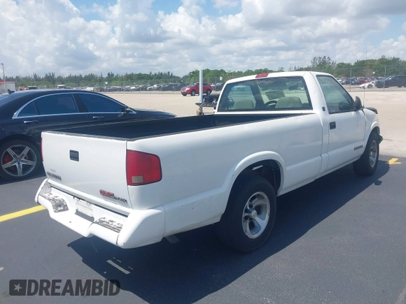 1997 GMC Sonoma with VIN 1GTCS1441VK518317, listed as a IAAI auction lot 42183464 with 75,862 mi miles. Bid and sale history available at carsss.com. Image 4.