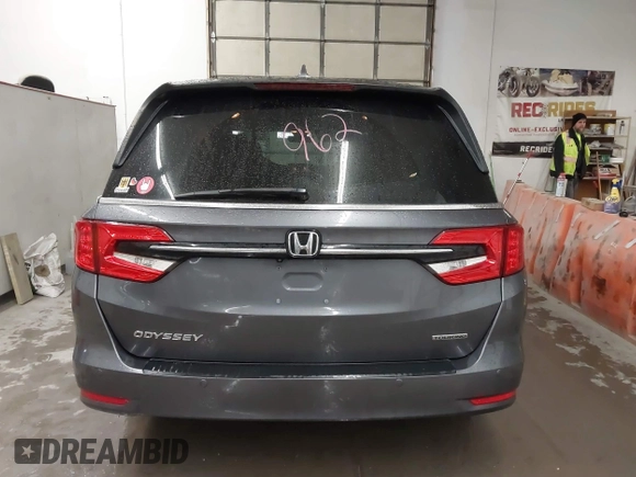 2021 Honda Odyssey Touring with VIN 5FNRL6H86MB026038, listed as a IAAI auction lot 41735249 with 68,480 mi miles. Bid and sale history available at carsss.com. Image 16.