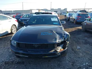 2009 Ford Mustang with VIN 1ZVHT80NX95113701, listed as a IAAI auction lot 42028558 with 100,224 mi miles and . Bid and sale history available at carsss.com. Image 10.