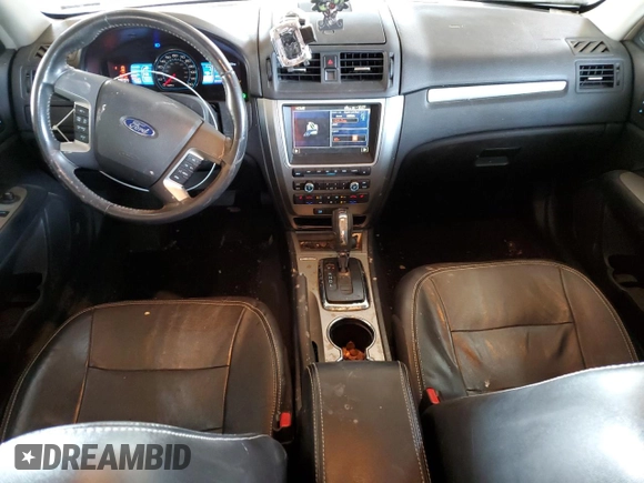 2012 Ford Fusion Hybrid с VIN 3FADP0L34CR416775, выставлен на аукционе Copart как лот 55108645 с пробегом 102 574 миль миль и Списание • Salvage title. История ставок и продаж доступна на DreamBid. Изображение 8.