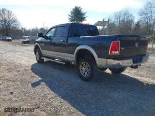 2016 Ram 2500 Laramie with VIN 3C6UR5FL3GG124072, listed as a IAAI auction lot 41305989 with 151,283 mi miles. Bid and sale history available at carsss.com. Image 3.