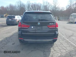 2014 BMW X5 xDrive35i with VIN 5UXKR0C57E0H20944, listed as a IAAI auction lot 42011451 with 208,205 mi miles. Bid and sale history available at carsss.com. Image 16.