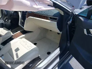 2017 Tesla Model S 60 с VIN 5YJSA1E10HF220006, выставлен на аукционе IAAI как лот 42190629 с пробегом 64 350 миль миль и . История ставок и продаж доступна на DreamBid. Изображение 5.