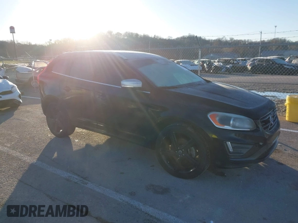 2014 Volvo XC60 R-Design Premier Plus z VIN YV4902DZ4E2537605, wystawiony jako IAAI lot #41126501 z przebiegiem 119 644 mil mil oraz . Historia ofert i sprzedaży dostępna na DreamBid. Obrazek 1.