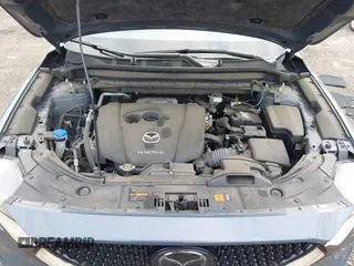 2021 Mazda CX-5 Touring with VIN JM3KFBCM5M0483547, listed as a IAAI auction lot 41683694 with 55,791 mi miles. Bid and sale history available at carsss.com. Image 10.