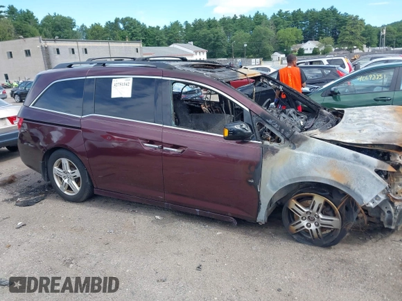 2012 Honda Odyssey Touring z VIN 5FNRL5H95CB040384, wystawiony jako IAAI lot #42751342 z przebiegiem 176 222 mil mil oraz . Historia ofert i sprzedaży dostępna na DreamBid. Obrazek 17.