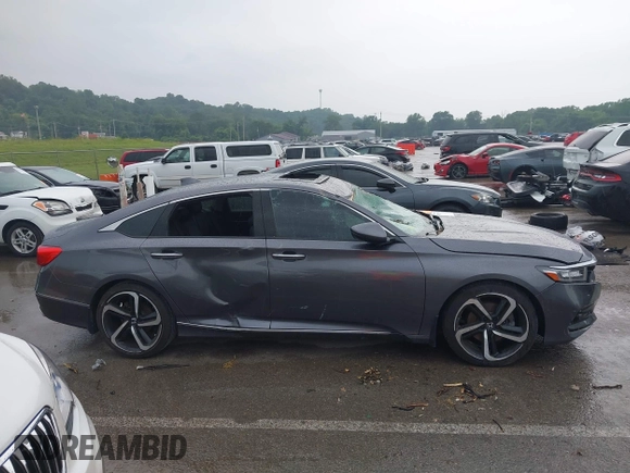 2018 Honda Accord Touring with VIN 1HGCV1F92JA005210, listed as a IAAI auction lot 42378040 with 69,294 mi miles and . Bid and sale history available at DreamBid. Image 14.