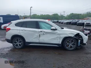 2018 BMW X1 xDrive28i with VIN WBXHT3C38J5L31322, listed as a IAAI auction lot 42260190 with 70,266 mi miles and . Bid and sale history available at DreamBid. Image 17.