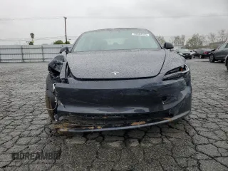 2025 Tesla Model 3 Long Range z VIN 5YJ3E1EA5SF900225, wystawiony jako Copart lot #48584355 z przebiegiem 4 869 mil mil oraz Szkoda całkowita • Salvage title. Historia ofert i sprzedaży dostępna na DreamBid. Obrazek 5.