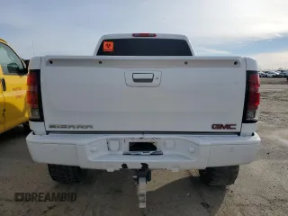 2007 GMC Sierra Denali z VIN 2GTEK638171644352, wystawiony jako Copart lot #44803455 z przebiegiem 202 481 mil mil oraz Szkody całkowita. Historia ofert i sprzedaży dostępna na DreamBid. Obrazek 6.