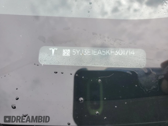 2019 Tesla Model 3 Mid Range z VIN 5YJ3E1EA5KF301714, wystawiony jako Copart lot #55273595 z przebiegiem Nie podano mil oraz Szkoda całkowita • Salvage title. Historia ofert i sprzedaży dostępna na DreamBid. Obrazek 12.
