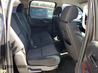 2011 Chevrolet Suburban LS z VIN 1GNSCHE0XBR383295, wystawiony jako Copart lot #60819305 z przebiegiem 133 643 mil mil oraz Szkoda całkowita • Salvage title. Historia ofert i sprzedaży dostępna na DreamBid. Obrazek 11.