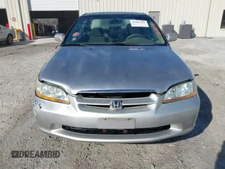 1998 Honda Accord LX z VIN 1HGCG1648WA069919, wystawiony jako IAAI lot #41685395 z przebiegiem 210 163 mil mil oraz . Historia ofert i sprzedaży dostępna na DreamBid. Obrazek 6.