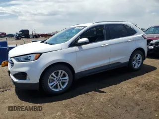 2019 Ford Edge SEL z VIN 2FMPK4J92KBB20277, wystawiony jako Copart lot #56405485 z przebiegiem 86 437 mil mil oraz Szkoda całkowita • Salvage title. Historia ofert i sprzedaży dostępna na DreamBid. Obrazek 1.