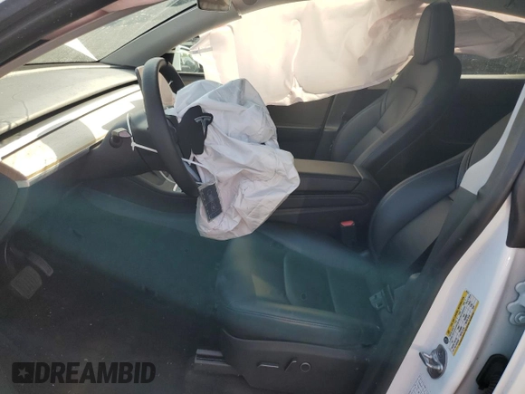2023 Tesla Model Y Long Range with VIN 7SAYGDEE6PA053274, listed as a Copart auction lot 52865175 with Not Provided miles and Salvage Title. Bid and sale history available at DreamBid. Image 7.