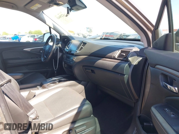 2022 Honda Ridgeline RTL with VIN 5FPYK3F58NB007618, listed as a IAAI auction lot 42258443 with 14,036 mi miles and . Bid and sale history available at DreamBid. Image 5.