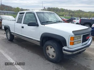 1996 GMC Sierra 1500 z VIN 1GTEK19R1TE542707, wystawiony jako IAAI lot #42006150 z przebiegiem 215 359 mil mil oraz . Historia ofert i sprzedaży dostępna na DreamBid. Obrazek 1.