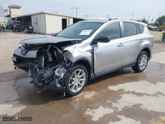 2018 Toyota RAV4 LE with VIN 2T3ZFREV2JW464807, listed as a IAAI auction lot 40966277 with 113,053 mi miles. Bid and sale history available at carsss.com. Image 18.