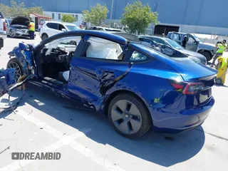 2023 Tesla Model 3 z VIN 5YJ3E1EA2PF506429, wystawiony jako IAAI lot #42320628 z przebiegiem Nie podano mil oraz . Historia ofert i sprzedaży dostępna na DreamBid. Obrazek 3.