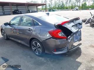 2018 Honda Civic Sedan EX-L with VIN JHMFC1F72JX044147, listed as a IAAI auction lot 42012754 with 86,264 mi miles. Bid and sale history available at carsss.com. Image 3.