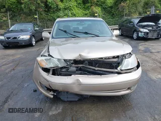 2004 Toyota Avalon XL with VIN 4T1BF28B44U384366, listed as a IAAI auction lot 42080614 with 250,291 mi miles and . Bid and sale history available at carsss.com. Image 12.