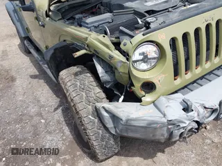 2013 Jeep Wrangler Unlimited Sport z VIN 1C4BJWDG0DL577812, wystawiony jako IAAI lot #42301104 z przebiegiem 138 387 mil mil oraz . Historia ofert i sprzedaży dostępna na DreamBid. Obrazek 6.