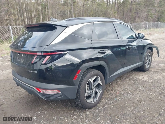 2022 Hyundai Tucson Hybrid SEL Convenience with VIN KM8JFCA15NU015911, listed as a IAAI auction lot 41875212 with 66,881 mi miles. Bid and sale history available at carsss.com. Image 4.