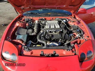 1997 Mitsubishi 3000GT z VIN JA3AM44H1VY005957, wystawiony jako Copart lot #78462164 z przebiegiem 71 194 mil mil oraz Tytuł czysty. Historia ofert i sprzedaży dostępna na DreamBid. Obrazek 11.