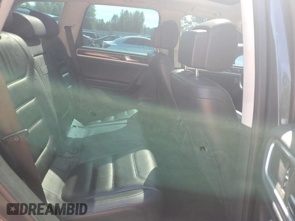 2015 Volkswagen Touareg Lux с VIN WVGEP9BP0FD006992, выставлен на аукционе Copart как лот 59524445 с пробегом 169 822 миль миль и Списание • Salvage title. История ставок и продаж доступна на DreamBid. Изображение 11.