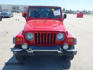 2001 Jeep Wrangler Sport with VIN 1J4FA49S11P375854, listed as a IAAI auction lot 42334037 with 215,027 mi miles and . Bid and sale history available at DreamBid. Image 12.
