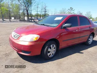 2003 Toyota Corolla CE with VIN 2T1BR32E13C148516, listed as a IAAI auction lot 42130324 with 210,596 mi miles and . Bid and sale history available at DreamBid. Image 2.