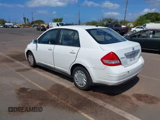 2009 Nissan Versa 1.8 S with VIN 3N1BC11E99L371998, listed as a IAAI auction lot 41723771 with 130,172 mi miles. Bid and sale history available at carsss.com. Image 3.