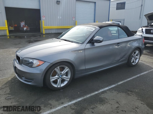 2011 BMW 1 Series 128i with VIN WBAUN1C50BVH83830, listed as a Copart auction lot 86539944 with 74,751 mi miles and Salvage Title. Bid and sale history available at carsss.com. Image 1.