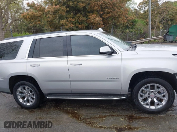 2015 GMC Yukon SLT with VIN 1GKS2BKC0FR676107, listed as a IAAI auction lot 41962929 with 132,389 mi miles. Bid and sale history available at carsss.com. Image 14.