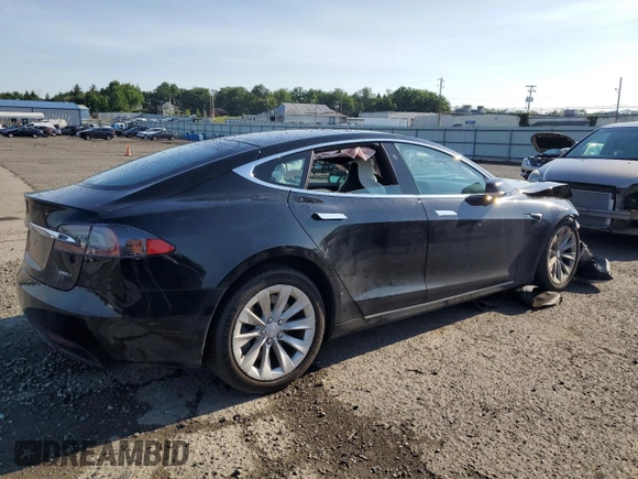2018 Tesla Model S 75D with VIN 5YJSA1E21JF284845, listed as a Copart auction lot 62549885 with Not provided miles and Clean title. Bid and sale history available at DreamBid. Image 3.
