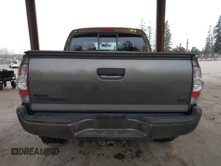2013 Toyota Tacoma z VIN 3TMLU4EN9DM124980, wystawiony jako IAAI lot #41576747 z przebiegiem 209 883 mil mil oraz . Historia ofert i sprzedaży dostępna na DreamBid. Obrazek 16.