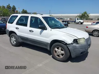 2004 Ford Escape XLS with VIN 1FMYU02124KA81554, listed as a IAAI auction lot 42117165 with 211,579 mi miles and . Bid and sale history available at DreamBid. Image 1.