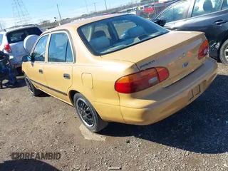 1999 Chevrolet Prizm z VIN 1Y1SK5284XZ400907, wystawiony jako IAAI lot #41821292 z przebiegiem 90 134 mil mil oraz . Historia ofert i sprzedaży dostępna na DreamBid. Obrazek 3.