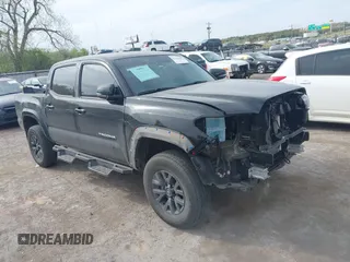 2023 Toyota Tacoma 4WD SR with VIN 3TYCZ5AN4PT170688, listed as a IAAI auction lot 41998053 with 20,770 mi miles. Bid and sale history available at carsss.com. Image 1.