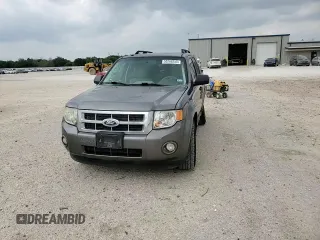 2010 Ford Escape XLT с VIN 1FMCU0D72AKD21676, выставлен на аукционе Copart как лот 55268255 с пробегом 172 355 миль миль и Списание • Salvage title. История ставок и продаж доступна на DreamBid. Изображение 13.