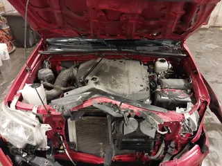 2015 Toyota Tacoma with VIN 3TMLU4EN3FM196518, listed as a IAAI auction lot 41198481 with 96,277 mi miles and . Bid and sale history available at DreamBid. Image 10.