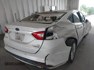 2013 Ford Fusion SE Hybrid with VIN 3FA6P0LU8DR357054, listed as a IAAI auction lot 42372168 with 143,979 mi miles and . Bid and sale history available at DreamBid. Image 4.