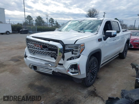 2020 GMC Sierra 1500 Denali z VIN 3GTU9FELXLG371258, wystawiony jako IAAI lot #41303490 z przebiegiem 63 571 mil mil oraz . Historia ofert i sprzedaży dostępna na DreamBid. Obrazek 19.