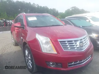 2014 Cadillac SRX Premium Collection z VIN 3GYFNDE36ES564140, wystawiony jako IAAI lot #42070008 z przebiegiem 69 768 mil mil oraz . Historia ofert i sprzedaży dostępna na DreamBid. Obrazek 1.